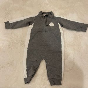 Moncler baby jumpsuit.
